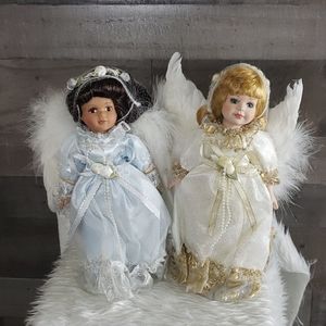 Pair of porcelain doll angels brunette and blonde